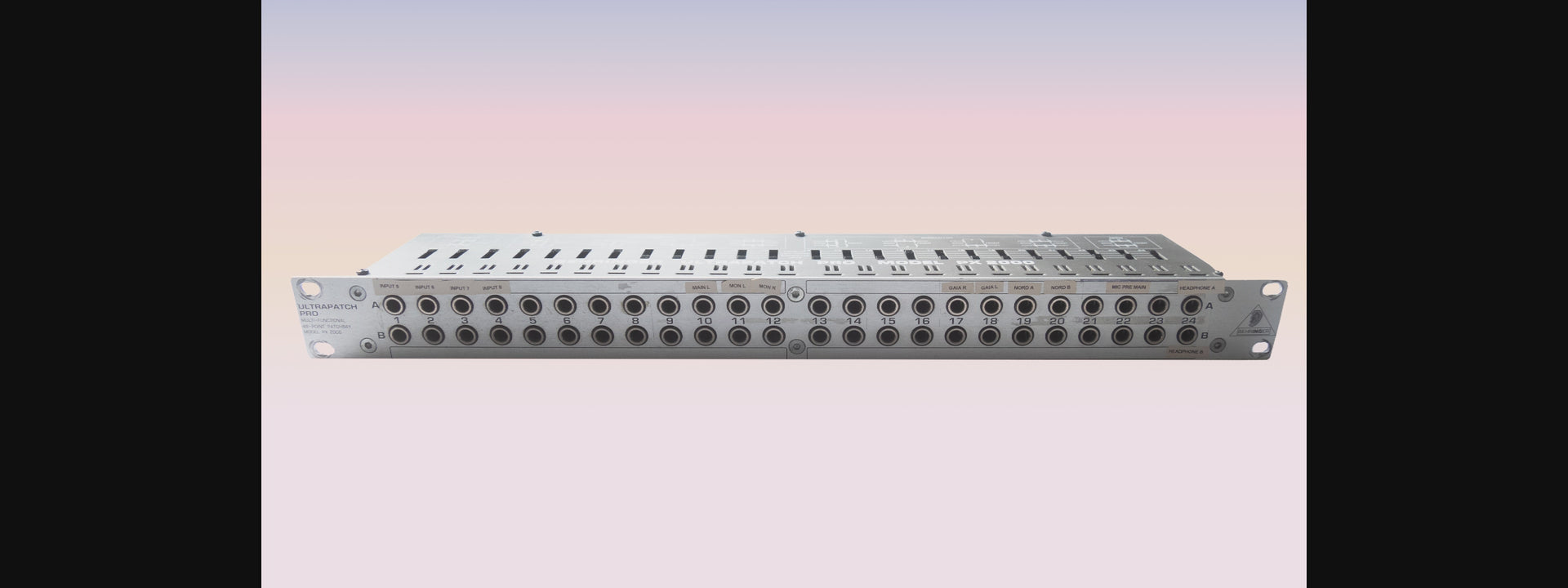 Before and after video showing a messy audio patchbay transformed with custom, vibrant colour-coded vinyl labels.